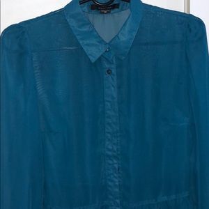 A turquoise blouse